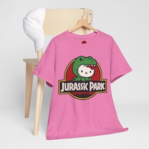 Hello Kitty Jurassic Park T-Shirt | Kawaii Dinosaur Mashup Tee | Cute Pink Graphic Shirt | Unisex Cotton Tee | Funny Movie Crossover Gift image 10
