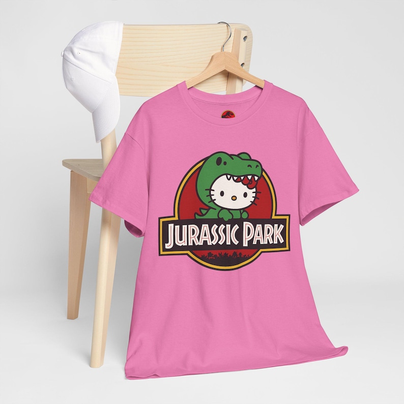 Hello Kitty Jurassic Park T-Shirt | Kawaii Dinosaur Mashup Tee | Cute Pink Graphic Shirt | Unisex Cotton Tee | Funny Movie Crossover Gift image 10
