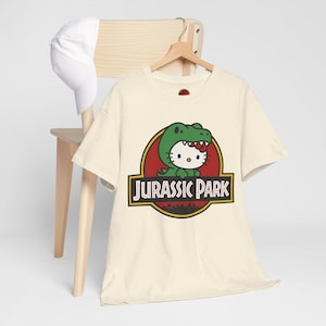Hello Kitty Jurassic Park T-Shirt | Kawaii Dinosaur Mashup Tee | Cute Pink Graphic Shirt | Unisex Cotton Tee | Funny Movie Crossover Gift image 7