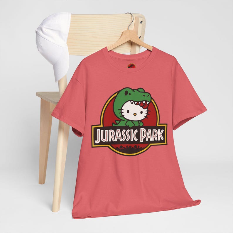 Hello Kitty Jurassic Park T-Shirt | Kawaii Dinosaur Mashup Tee | Cute Pink Graphic Shirt | Unisex Cotton Tee | Funny Movie Crossover Gift image 4