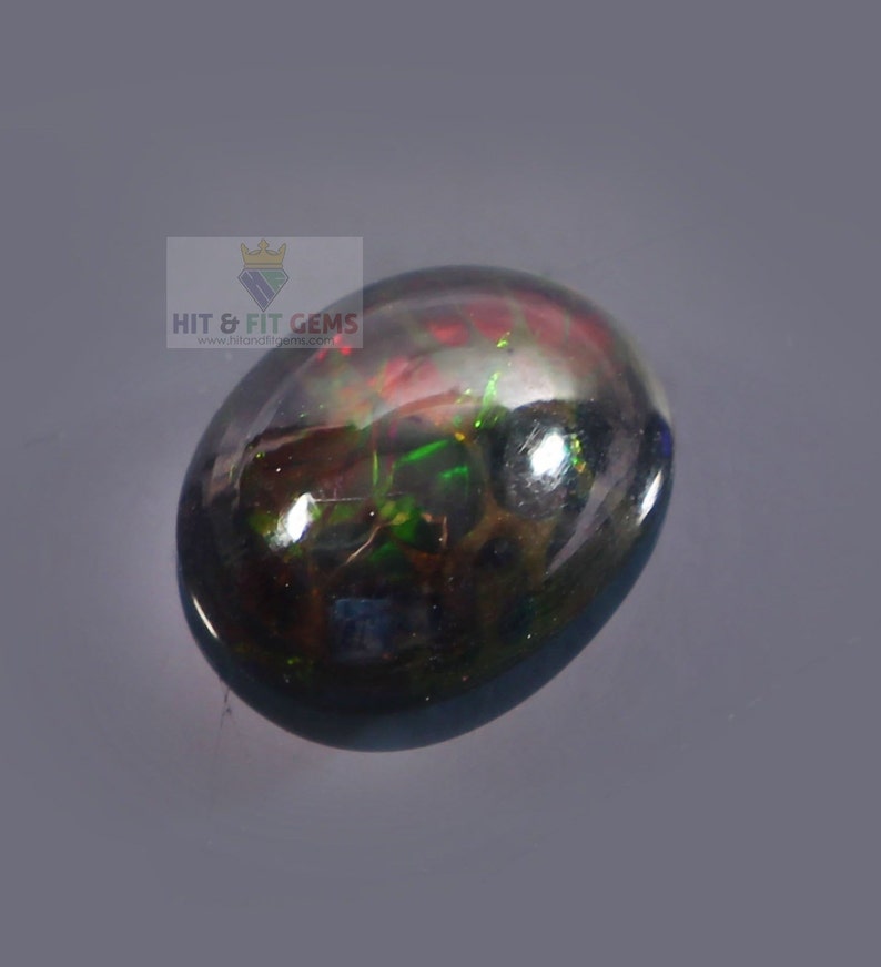 1.45Carat Black Opal Oval Cabochon 10x8mm Natural Ethiopian Welo Fire Opal Video Available