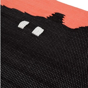 May include: Black and coral woven rug with a geometric pattern. The rug has a textured surface and is made of a soft, durable material.