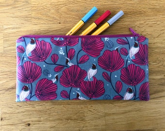 pencil case in blue gray coated fabric with hummingbird print