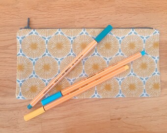 pencil kit in duck blue and mustard yellow print wax