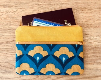 coin purse with exterior zipped pocket in vintage printed fabric lined in mustard yellow and blue