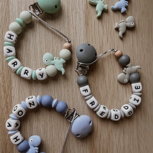 DINO personalised dummy clip, pacifier clip,silicone dummy holder, pacifier chain, dummy chain, MAM, bibs,personalised