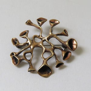 Vintage brooch Hannu Ikonen for Valo Koru Finland 1970s reindeer moss blossom brooch bronze