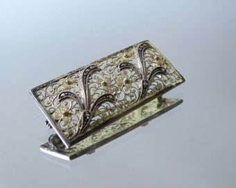 Broche ancienne style Art Déco en argent avec marcassites et pierre en verre orange - France