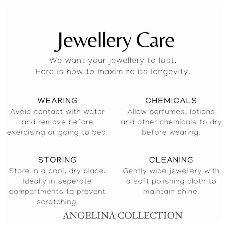 May include: A white informational card titled Jewellery Care with black text. It provides instructions on wearing, chemicals, storing, and cleaning jewelry to maintain longevity. The bottom of the card displays the text ANGELINA COLLECTION.