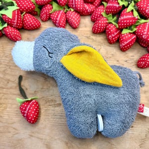 Asinello grigio scuro con orecchie gialle | Giocattolo musicale o peluche per neonati | Regalo personalizzato per neonati • Melodia selezionabile, realizzato a mano a Berlino