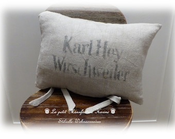 Coussin de sac à grains antique nostalgique avec écriture originale dans le style shabby chic, vintage, brocante, art populaire, style maison de campagne