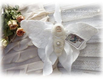 Nostalgic large lace/linen butterfly child in shabby chic, vintage, country house style