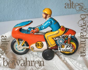 Motorcycle tin toy