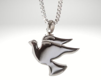 May include: A silver dove pendant necklace with a delicate chain. The dove is a symbol of peace and hope.