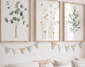 May include: A light wood storage bench with white bins and pillows. Above the bench are three framed botanical prints and a banner. A large woven giraffe stands to the right, creating a cozy nursery or playroom setting.