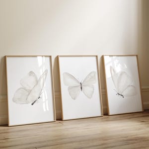 Farfalle bianche minimaliste - Set di 3 stampe, arte minimalista, opera d'arte per la cameretta delle bambine, decorazione da parete neutra, poster moderno sopra la culla