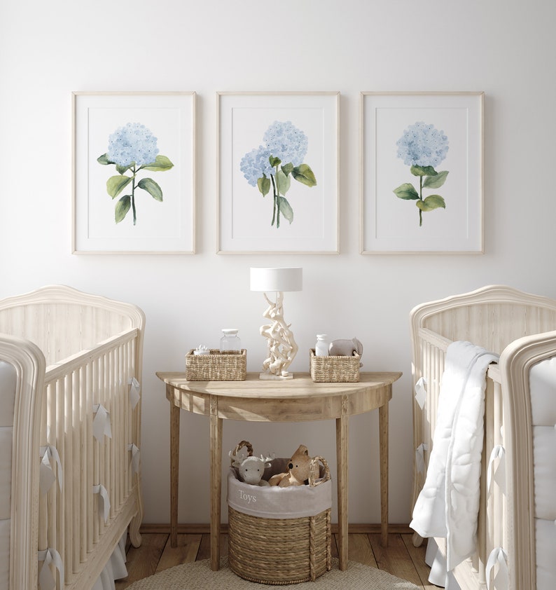 watercolor blue hydrangea set of 3 prints hanging in a modern boho nursery for twins
