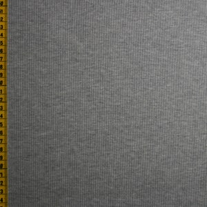 Könnte beinhalten: Nahaufnahme eines grauen Rippstoffs mit einem gelben Maßband, das vertikal am linken Rand entlangläuft. Das Band misst von 50 bis 74.