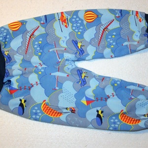 Cute bloomers, printed with airplanes, balloons, dragons and blue-gray clouds, size. 68