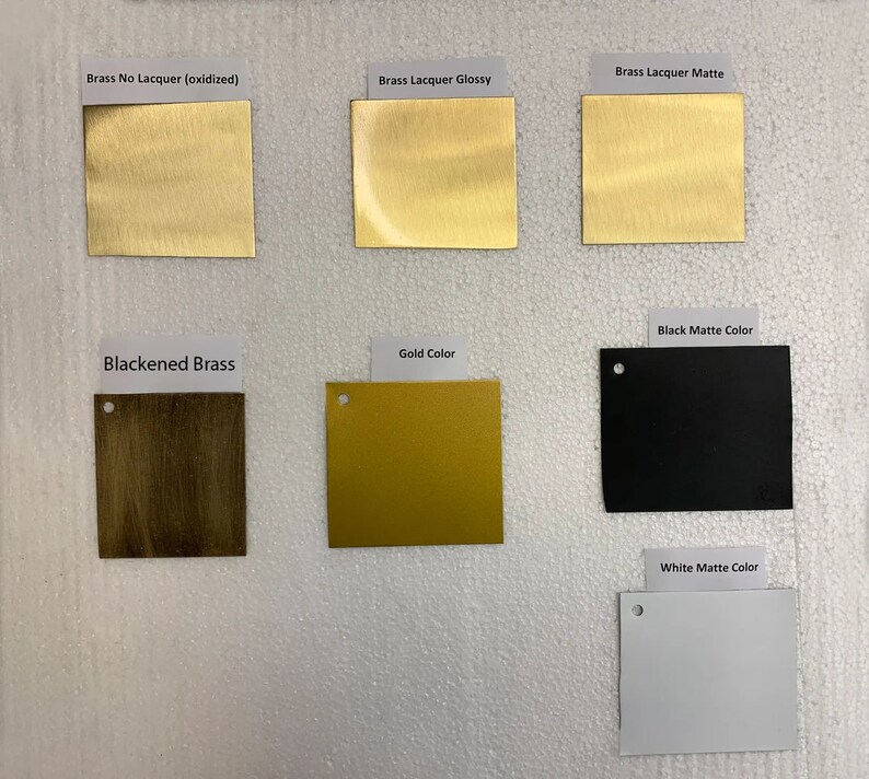 May include: A comparison of different brass finishes, including brass no lacquer oxidized, brass lacquer glossy, brass lacquer matte, blackened brass, gold color, black matte color, and white matte color.