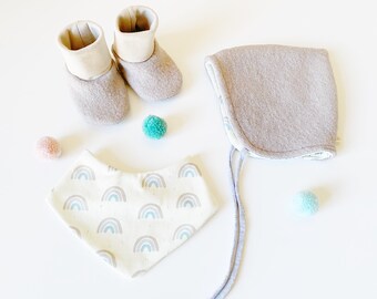 Baby set consisting of a fulled cap (dwarf hat), bay shoes made of braided and a baby towel made of organic cotton jersey.