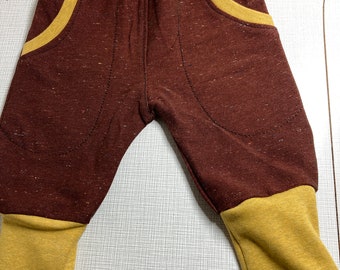 Elegant bloomers, rust-red mottled, mustard-colored cuffs, trousers, children's trousers