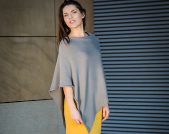 Knitted asymmetrical poncho sweater in gray