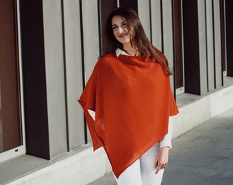 Knitted asymmetrical poncho in orange