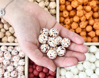 Round bead with pattern in laboratory-tested silicone / Complies with toy standard EN71-3 / baby pacifier clip