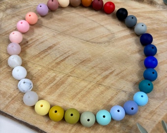 15mm round silicone bead tested in the laboratory / Complies with toy standard EN71-3 / baby pacifier clip