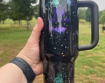 Galaxy inspired Stanley tumbler.