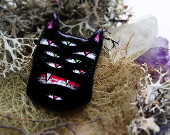 Broche TODO VER CAT 2