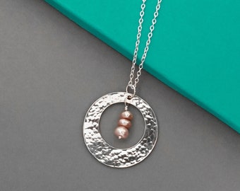 Sterling silver and pink pearl necklace | Handmade hammer textured circle and freshwater dyed pearl gemstone pendant on an 18 inch chain