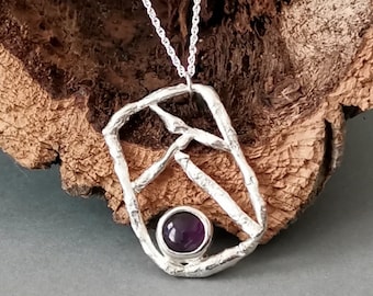 Sterling silver and amethyst necklace | Handmade chunky organic molten geometric pendant with a purple gemstone on an 18 inch chain