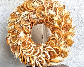 Autumn wreath with orange slices Thanksgiving decoration