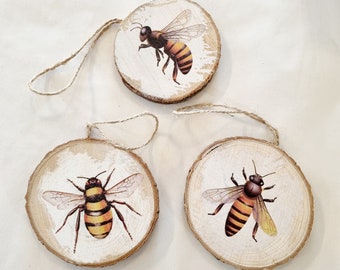 Wooden disc pendant with bee