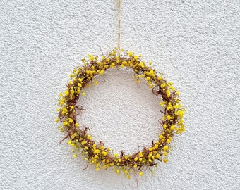 Gypsophila wreath in yellow sun