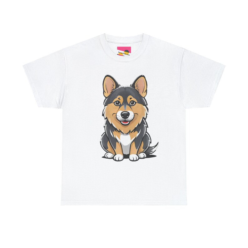 May include: A white t-shirt features a cartoon illustration of a corgi dog. The corgi is predominantly dark gray and black, with tan accents on its face and legs. It is sitting and looking directly at the viewer. The image is centered on the shirt. The shirt is a simple, short-sleeved crew neck style.