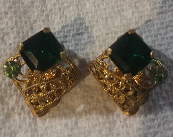 Vintage Gold Toned Filigree Clip On Earrings (Non-Pierced Ears) with Square Faux Emerald Stone Inset in Center.