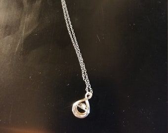 Rhythm in motion necklace sale