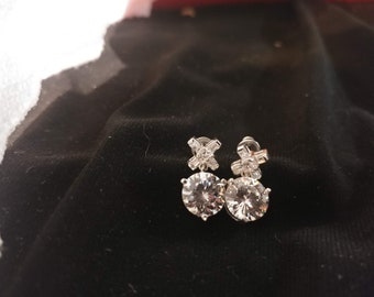 Vintage Silver Toned Dangle Earrings for Pierced Ears with Cubic Zirconia. "X" Shaped Top with Clear Dangling CZ Stone. 3/8" Long