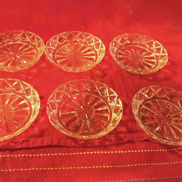 Vintage Set of 6- Sandwich Glass Coasters with Cut Starburst Center and Raised Sides. 4" Diameters Across. Excellent Condition!