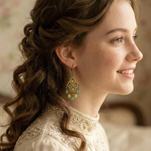 May include: A white ceramic mug with a black handle and the text "But First, Coffee" in a black, bold font. The mug is sitting on a white surface. The mug is approximately 4 inches tall.