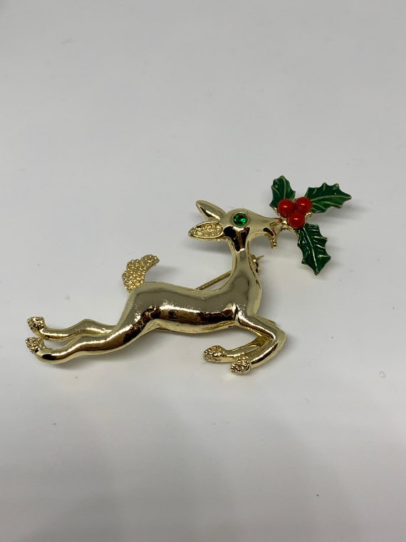 Leeping Reindeer with Holly  Christmas pin signed Gerrys collectible vintage brooch