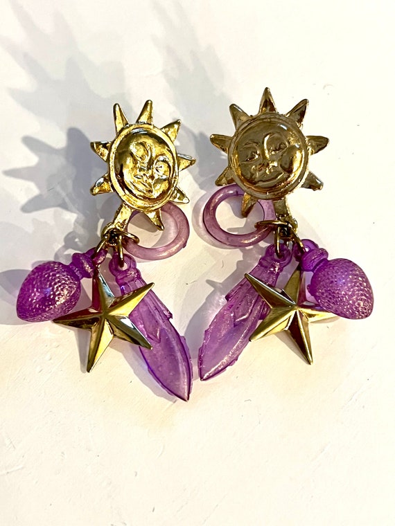 Y2K Celestial Dangles, Gold Sun Face with Purple Beads and Star Charms, Trending 90s Glam Jewelry