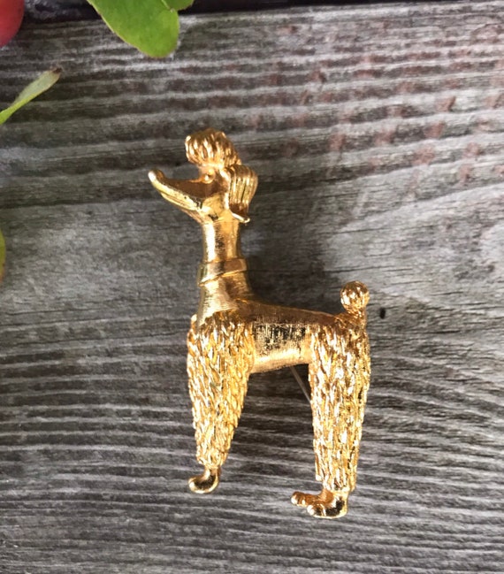 A little Vintage Goldtone Poodle Brooch Pin