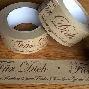 May include: Three rolls of brown paper tape with the text "F&uuml;r Dich" and "Geteilte Freude ist doppelte Freude. J.W. von Goethe" printed on them.