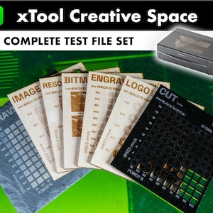May include: A set of test files for a laser engraver, including a black acrylic sheet, birch plywood, and a slate tile. The files are labelled with different engraving settings, such as "Image", "Resolution", "Bitmap", "Engrave", and "Logo".