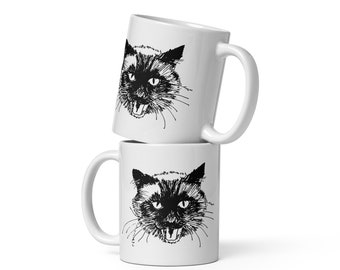 Mugg med en teckning av den siamesiska kattungen som heter Katman eller Katmandu