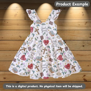 May include: White dress with a repeating pattern of crosses, hearts, books, and the words "God is good", "Walk by faith", and "Jesus". The dress has a ruffled hem and flutter sleeves. The text "Product Example" is at the top.
